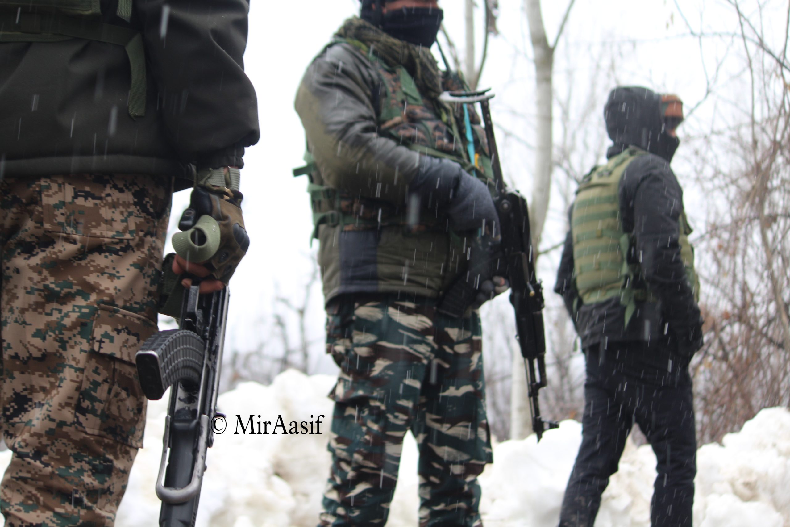 CRPF Personnel Holding Weapons During Encounter at Kilbal Area of Shopian District Photo || Mir Aasif