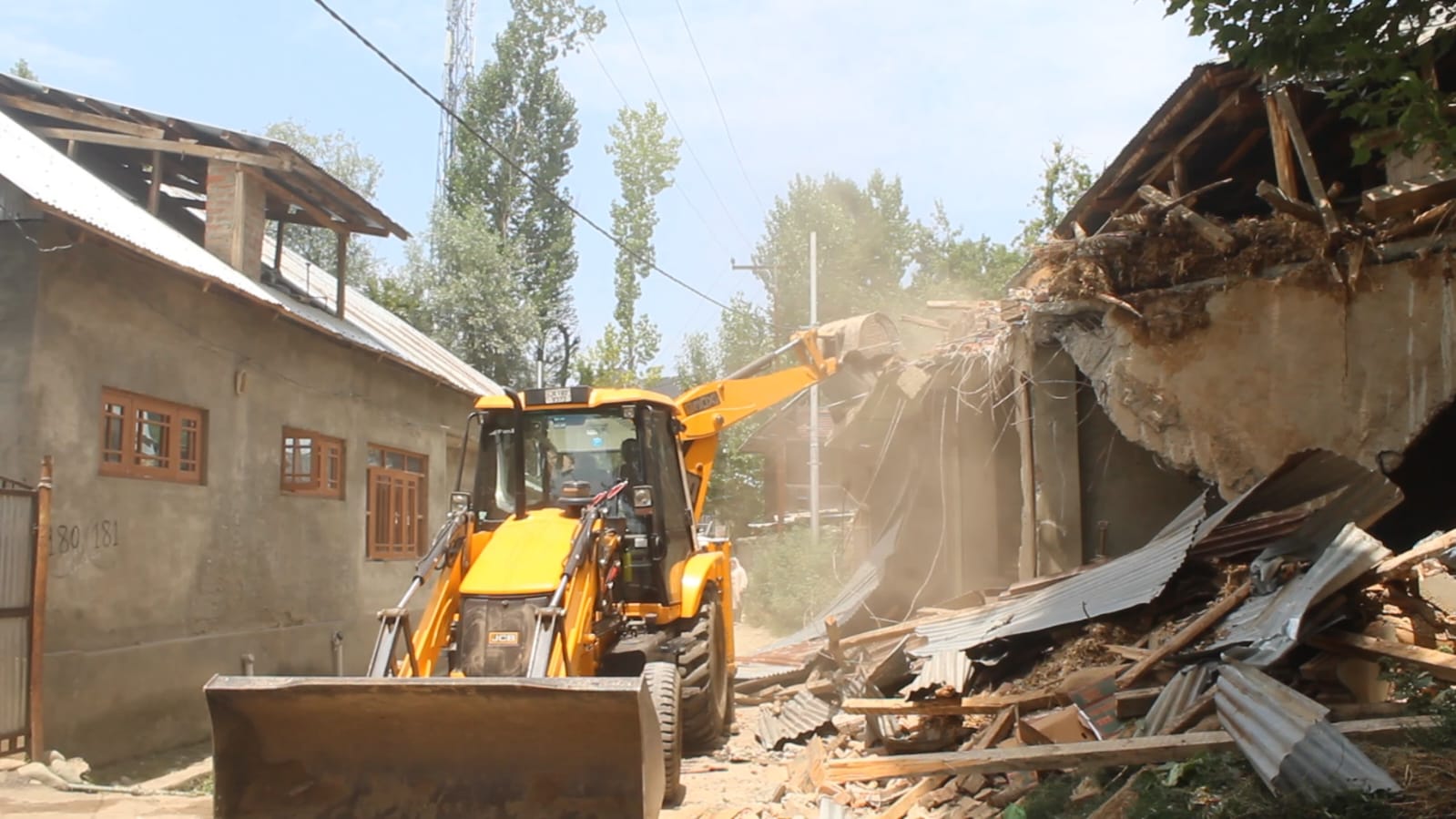Kashmir: Four Illegal Properties Linked to Alleged Drug Peddlers Demolished